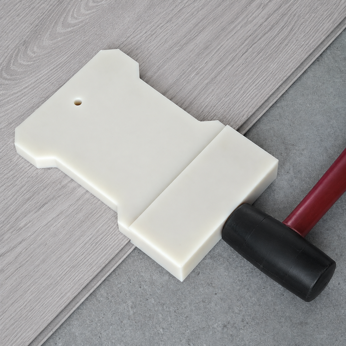 Laminate flooring tapping block for installation