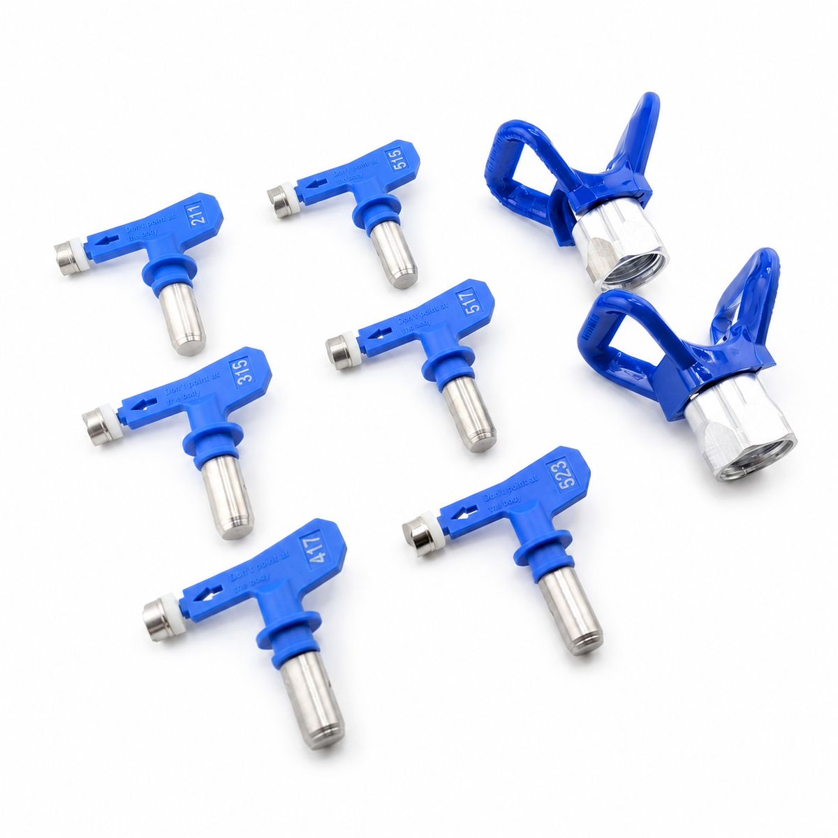 Reversible airless paint sprayer nozzle tips